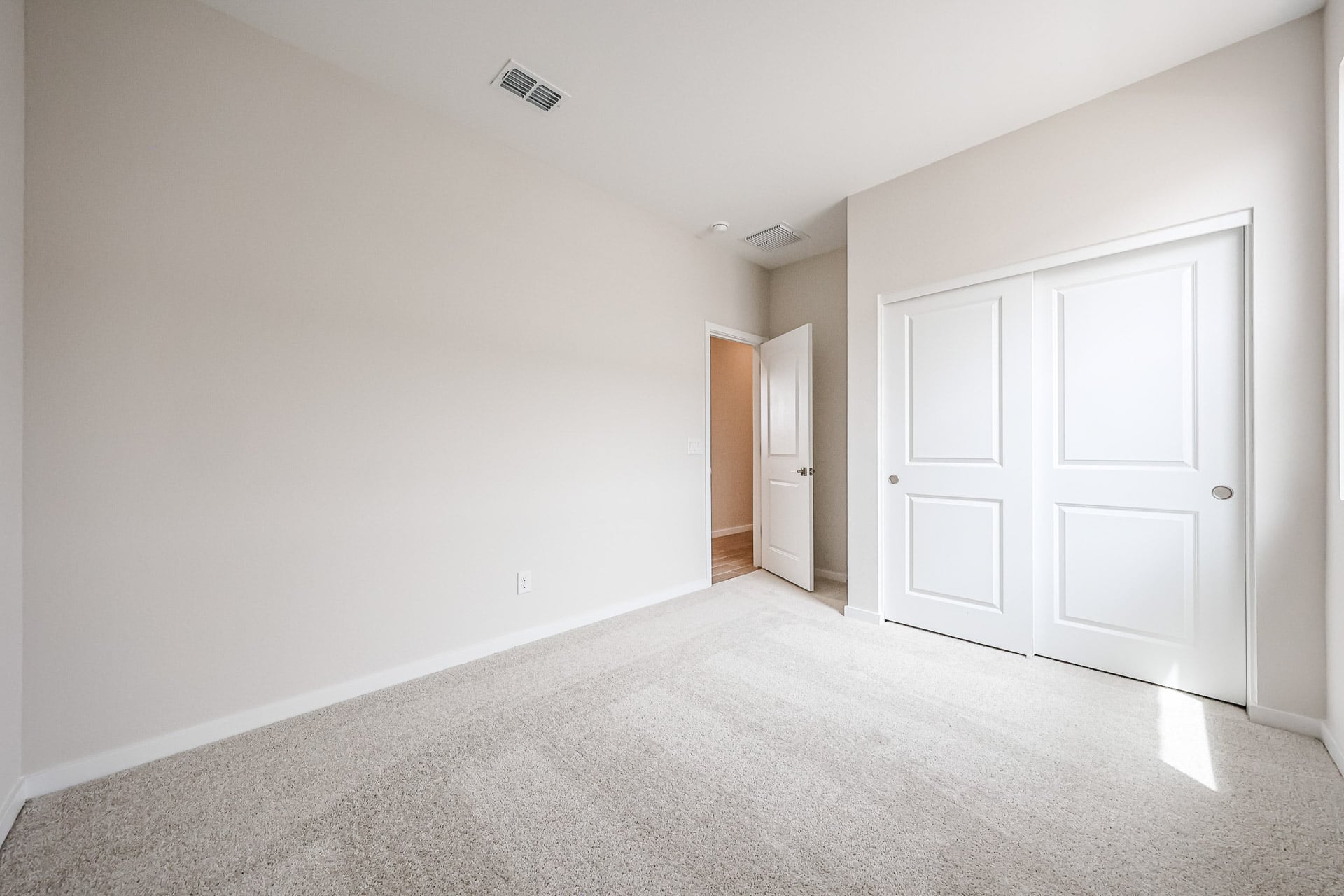 A room with white doors.