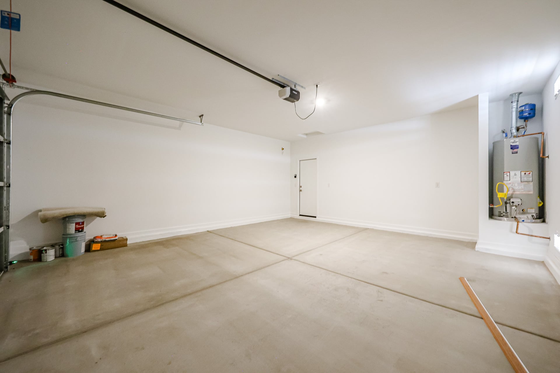 A room with a white wall and a white floor.