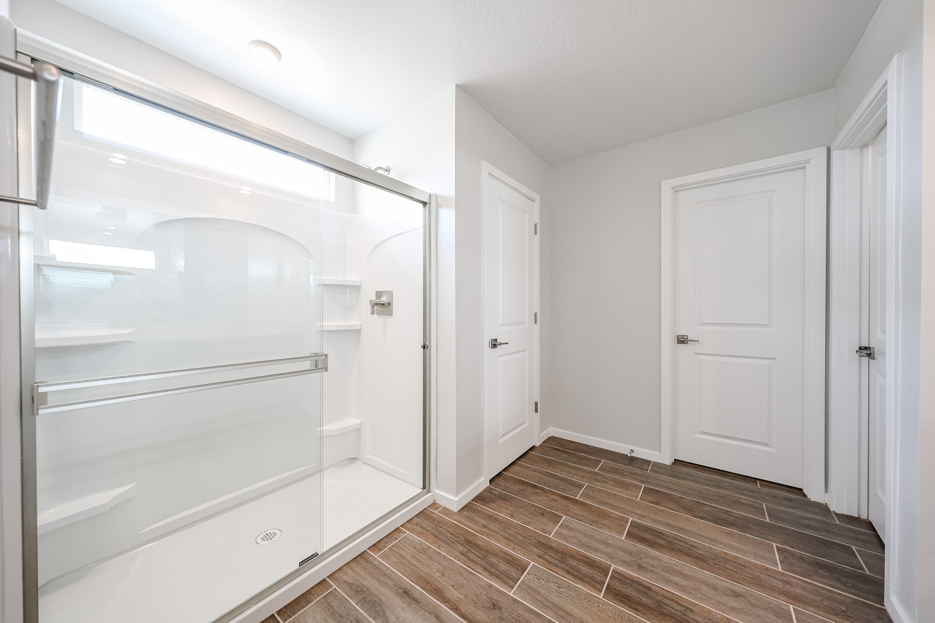A room with white doors.