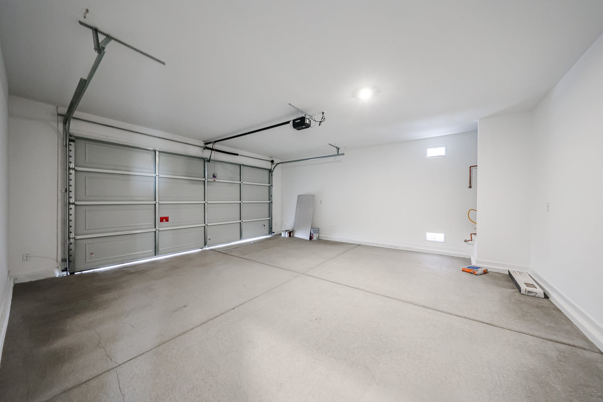A room with a metal gate.