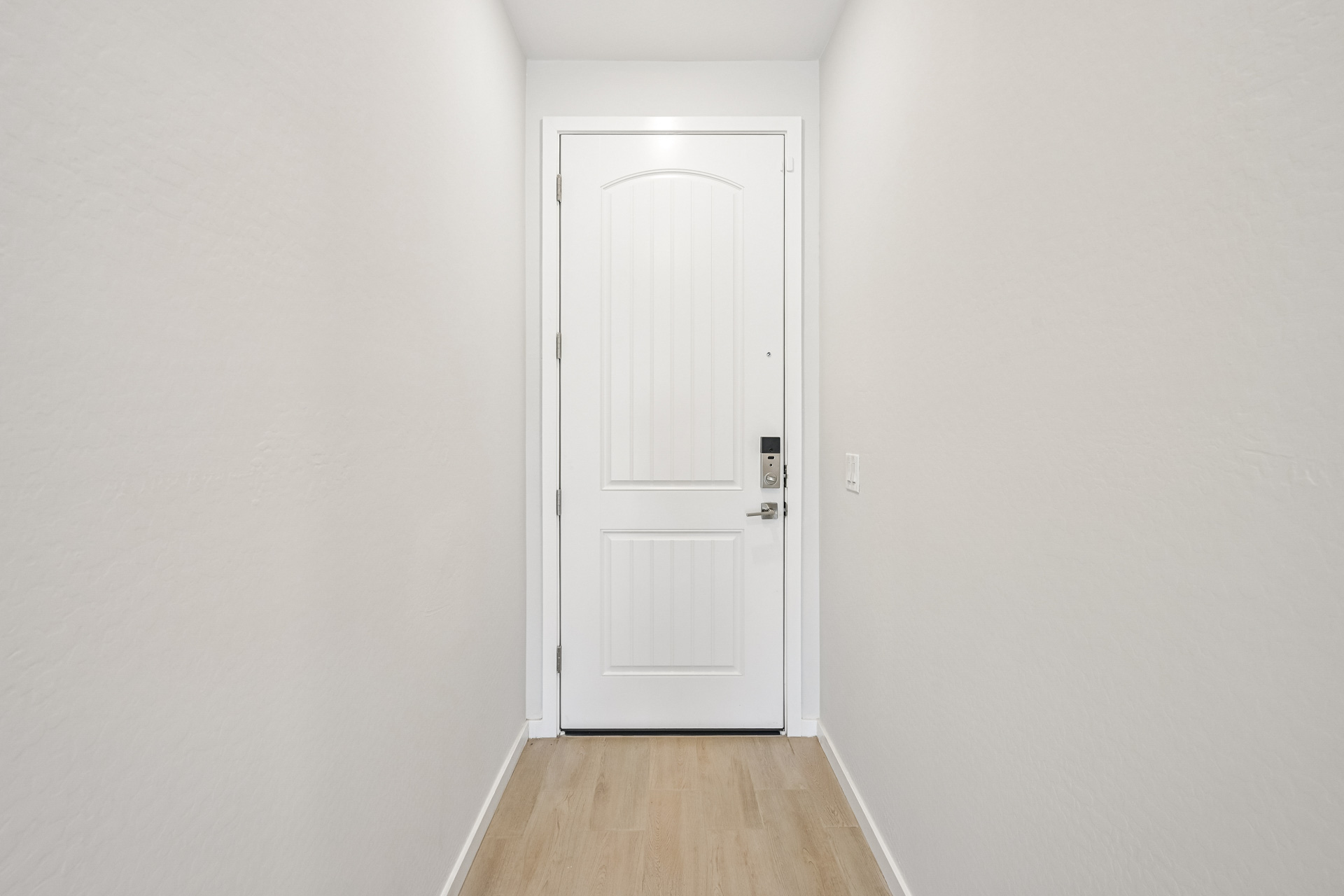 A white door in a room.