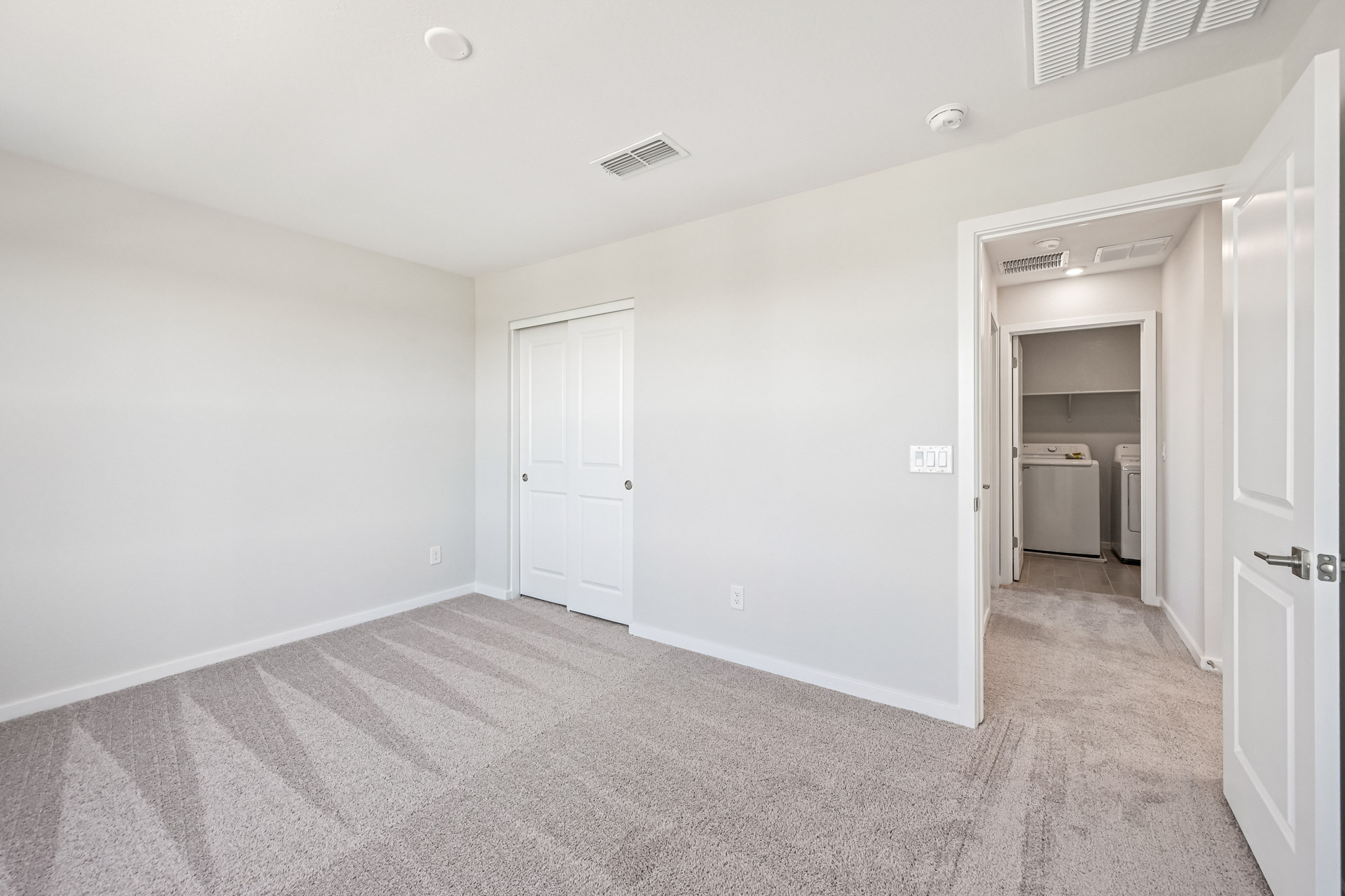 A room with white doors.