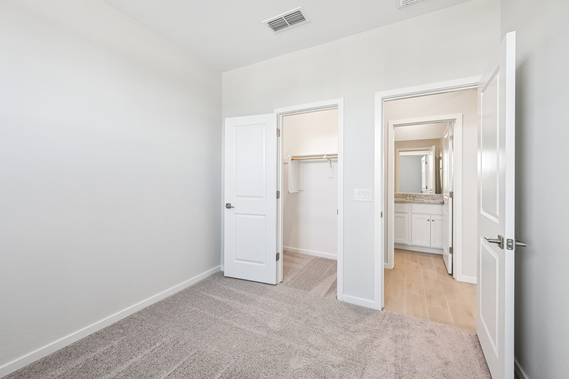 A room with white doors.