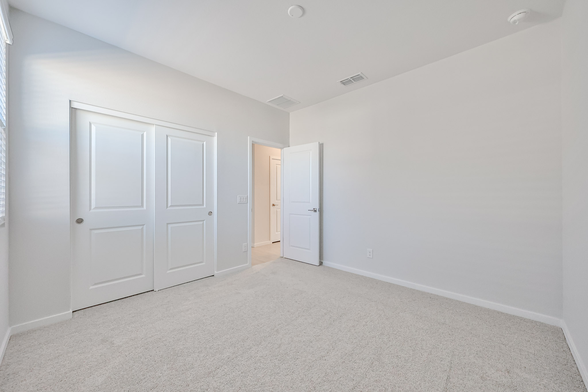 A room with white doors.