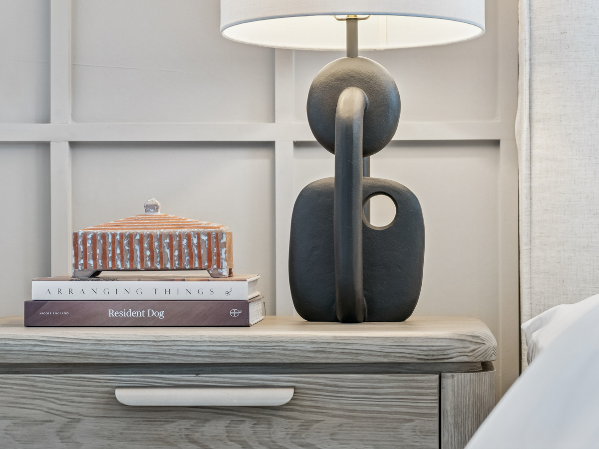 A lamp on top of books.