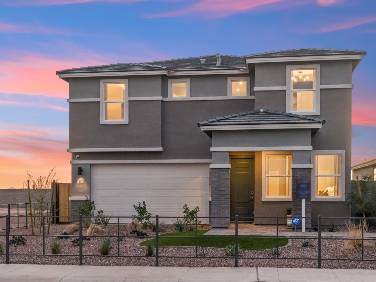 A house with a fence around it.