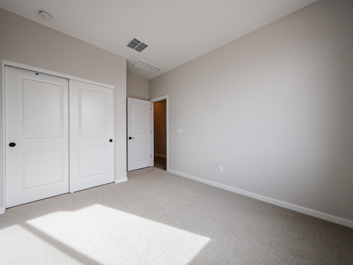 A room with white doors.