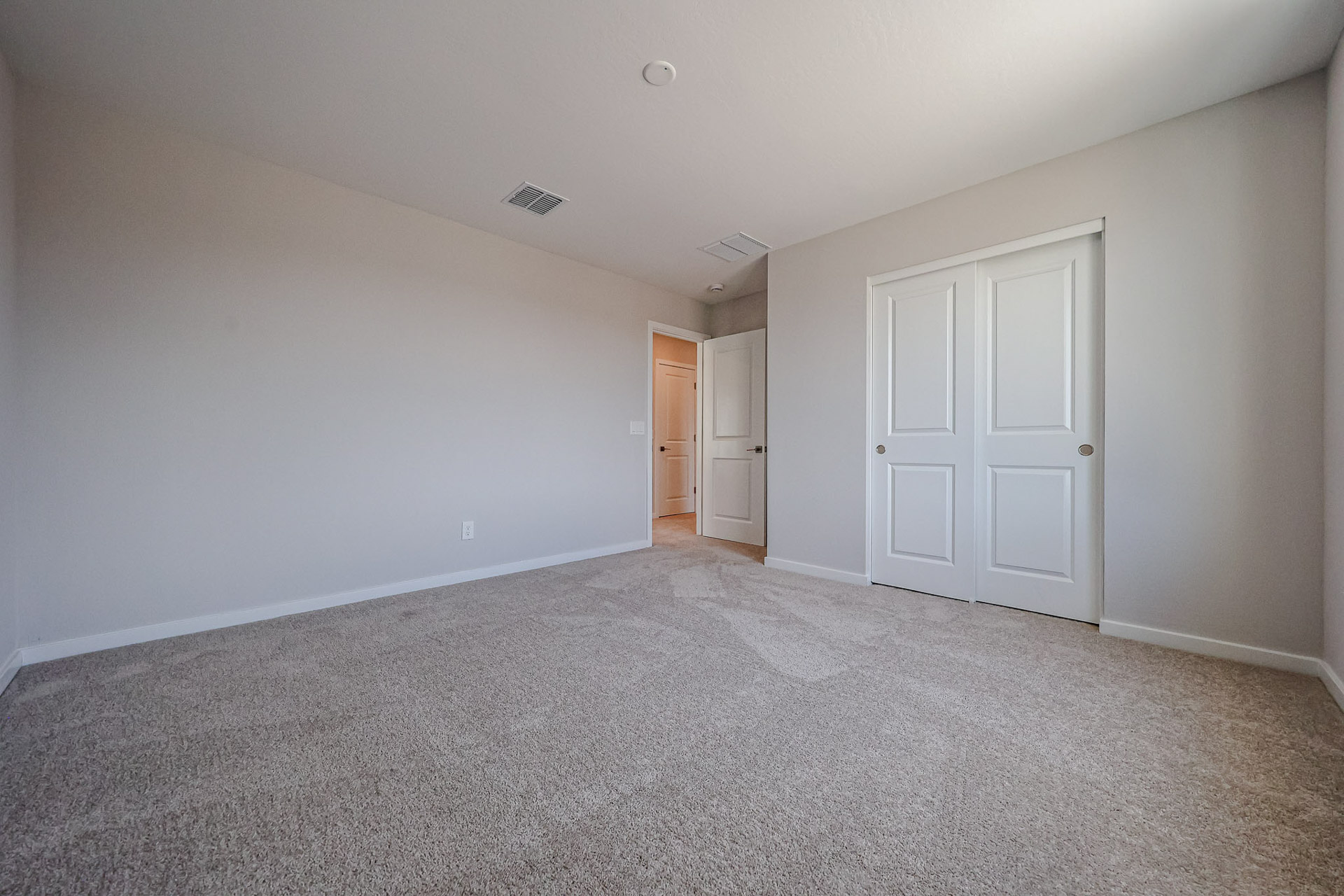 A room with white doors.