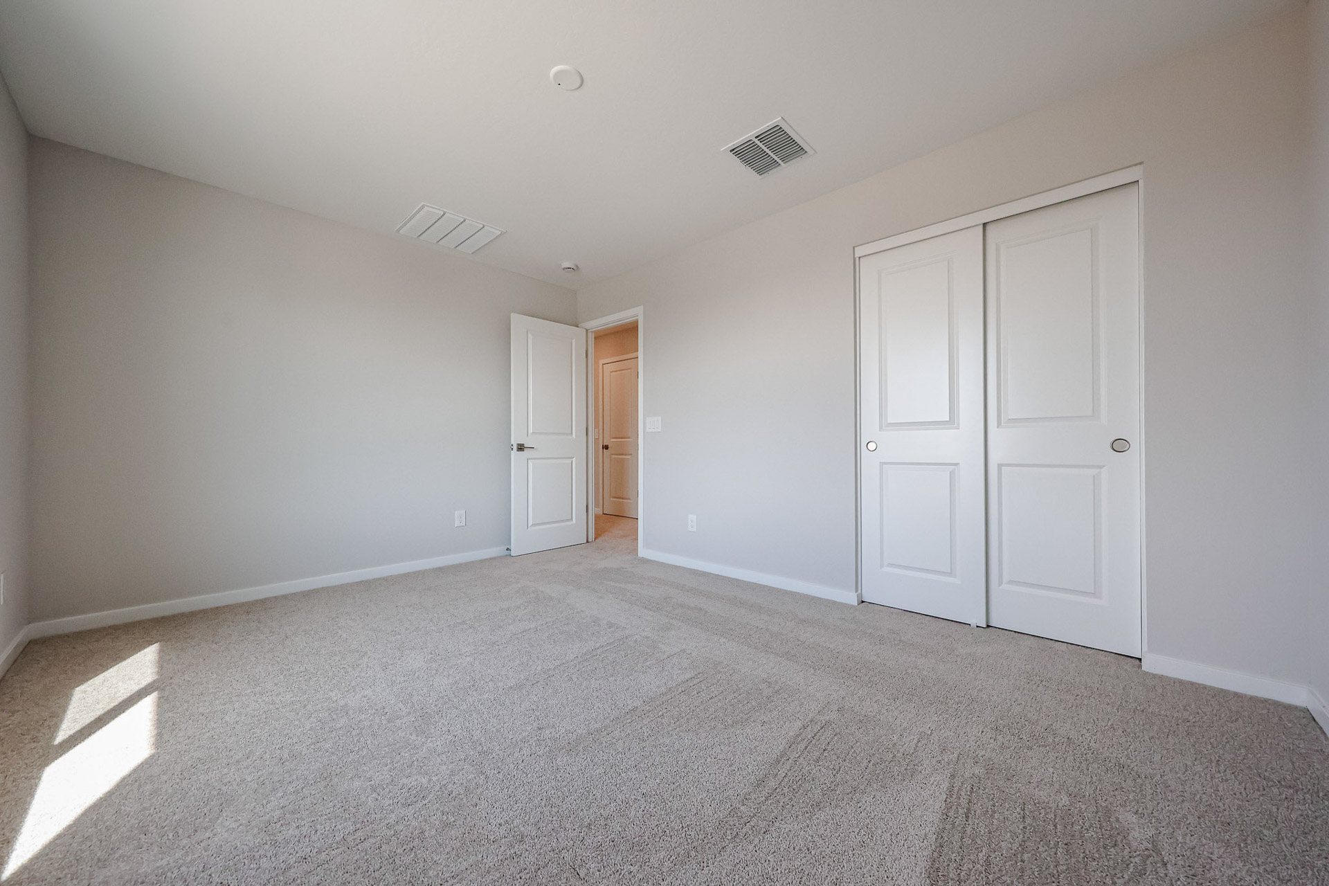 A room with white doors.