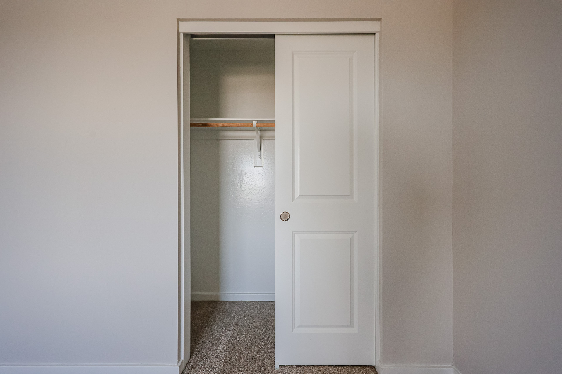 A white door in a room.