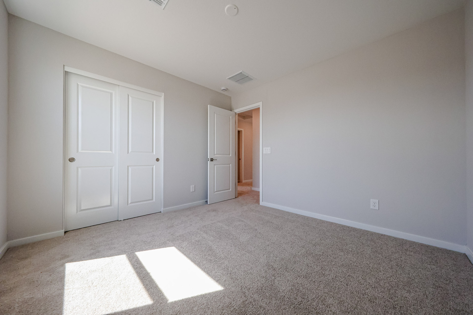 A room with white doors.