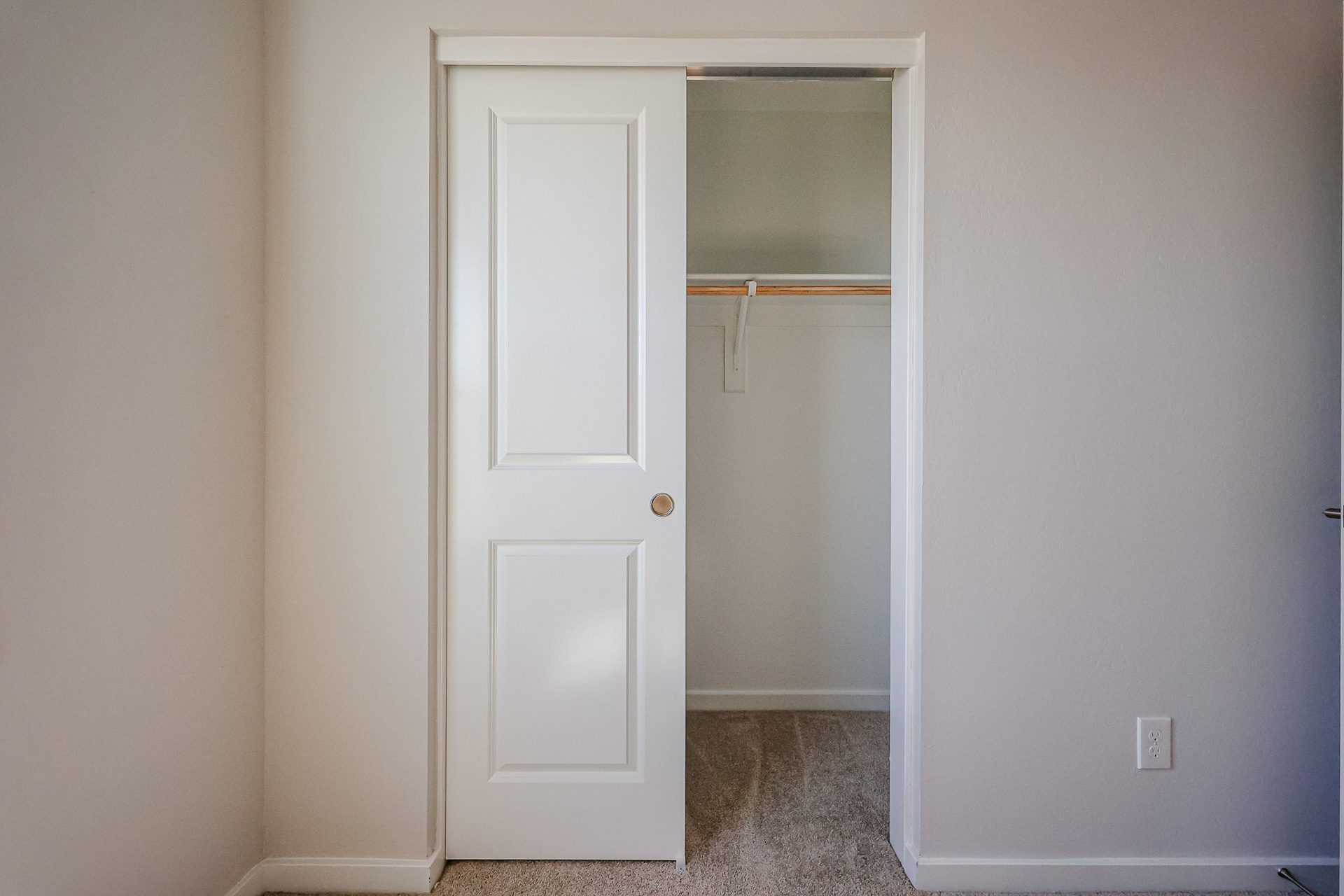 A white door in a room.