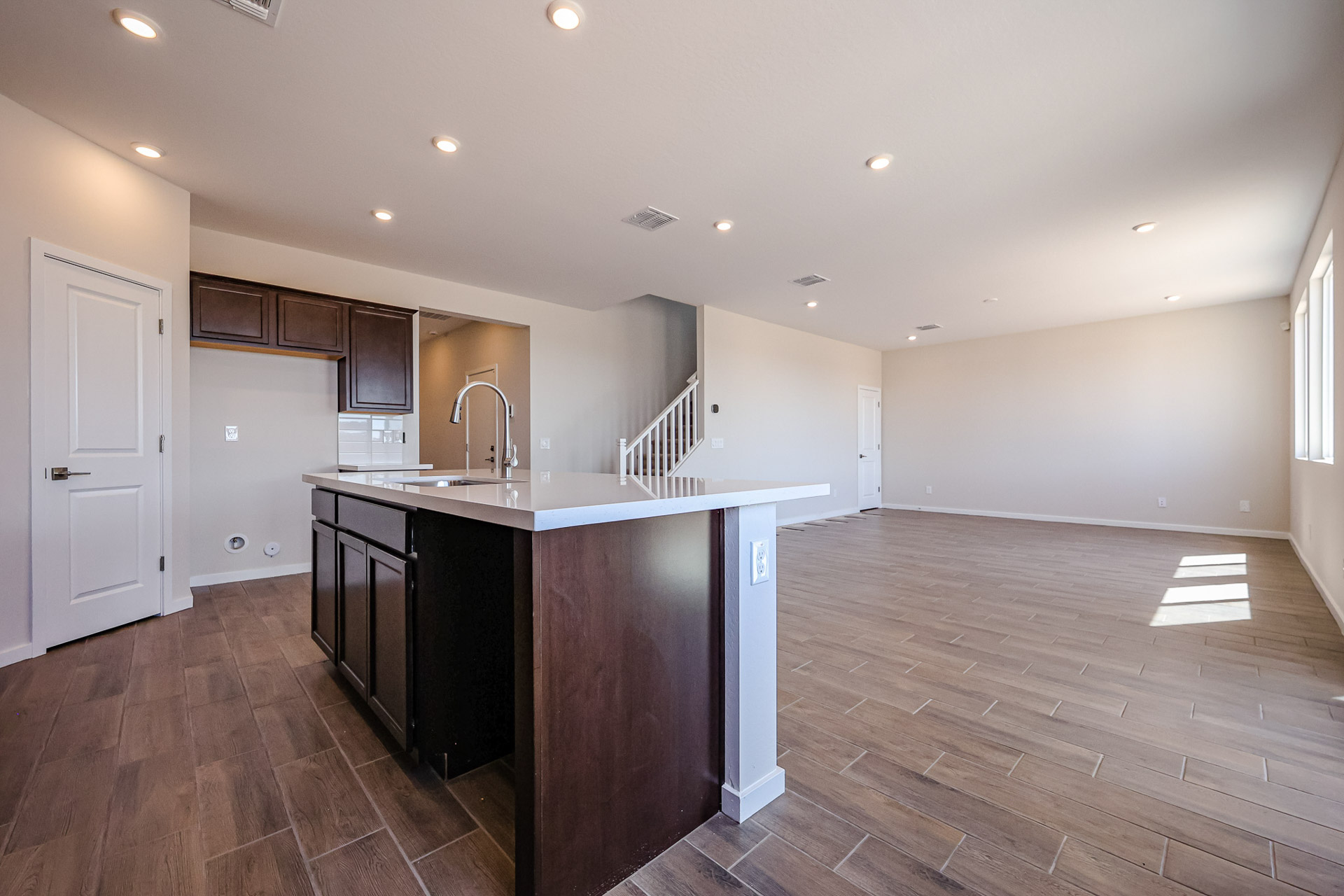 A kitchen with black appliances.