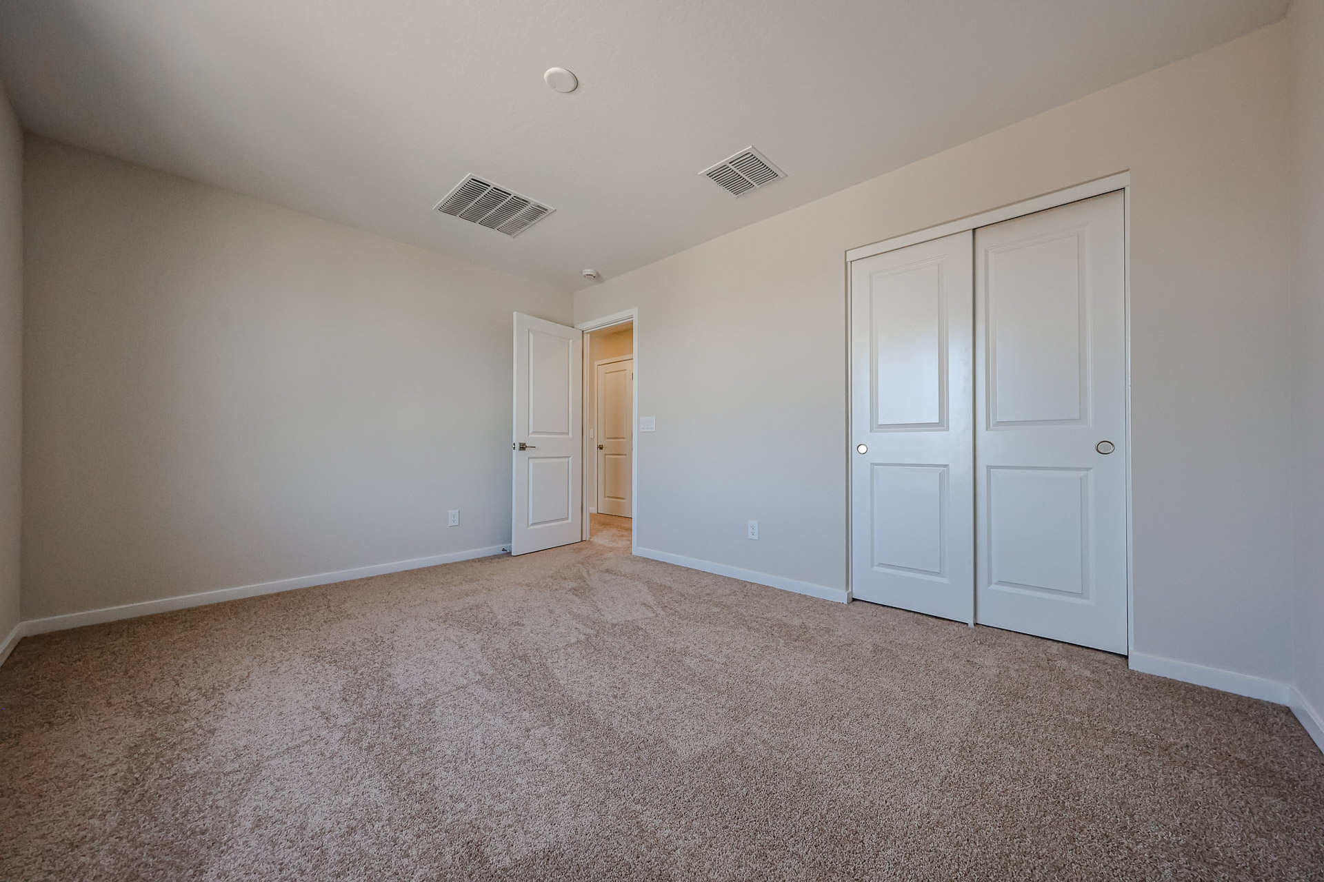 A room with white doors.