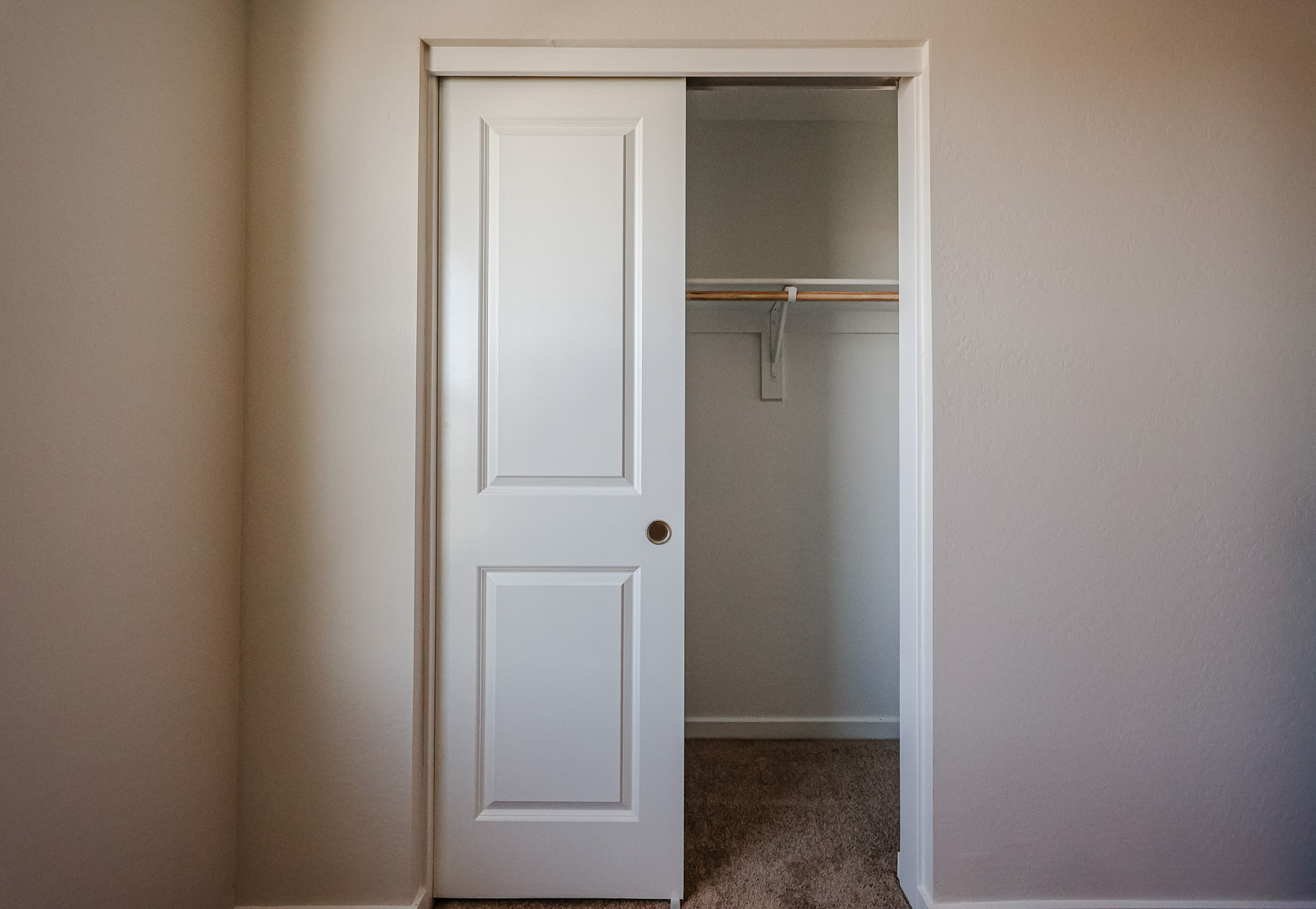 A white door in a room.
