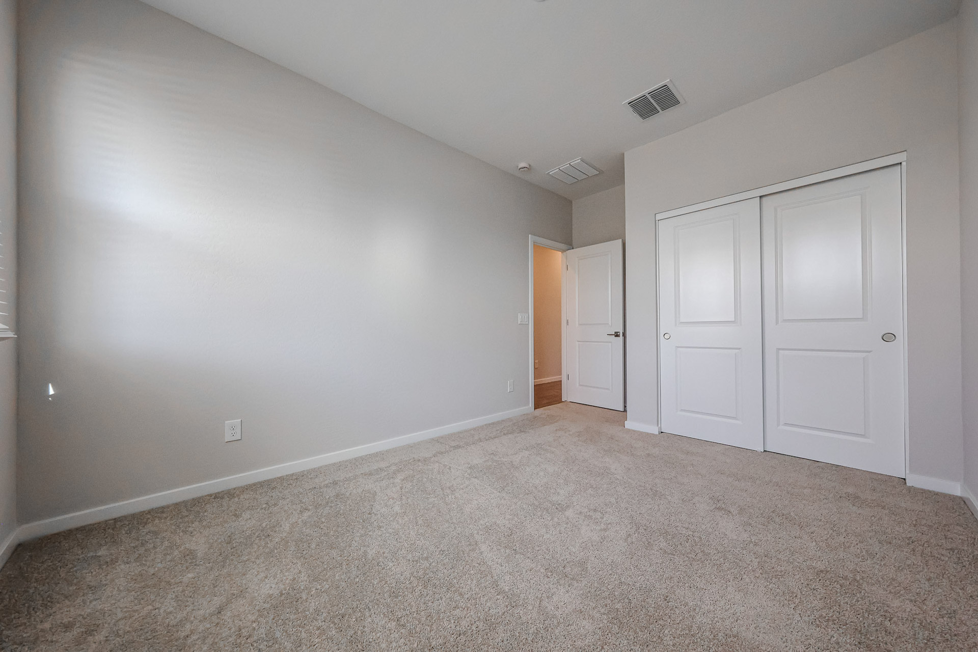 A room with white doors.