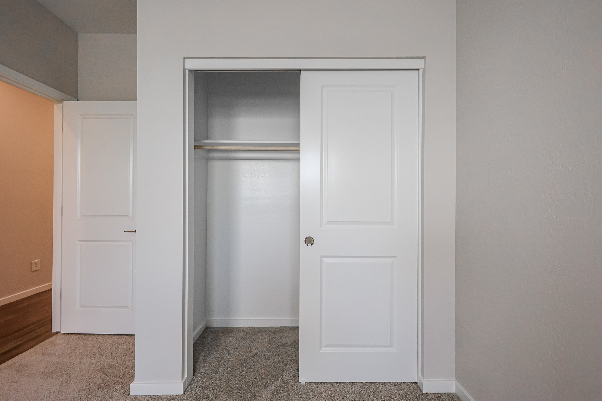 A white door in a room.