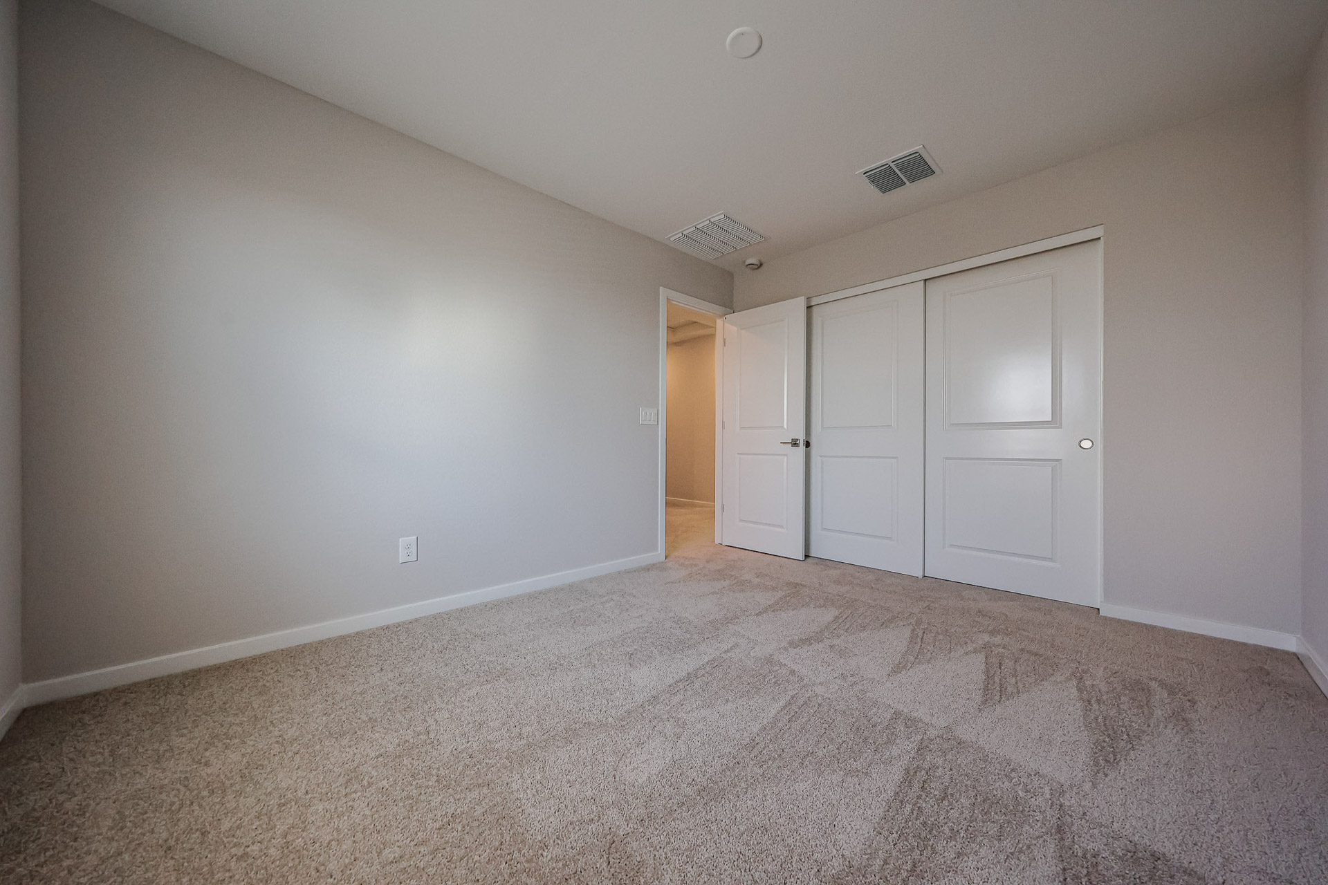 A room with white doors.