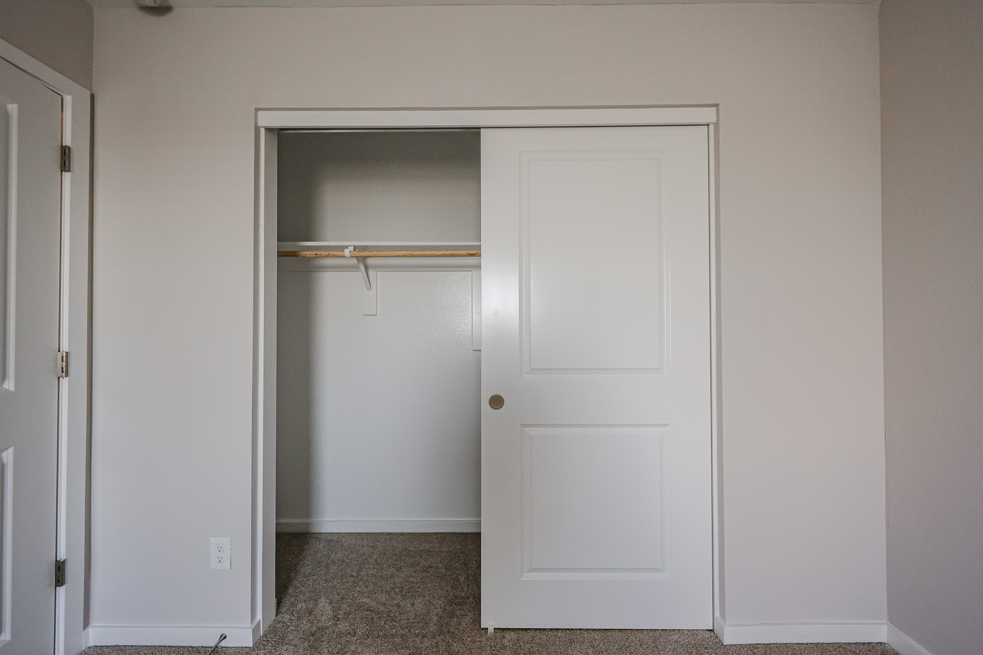 A white door with a glass window.