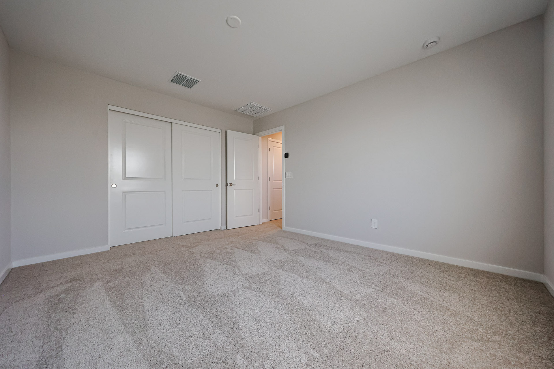 A room with white doors.