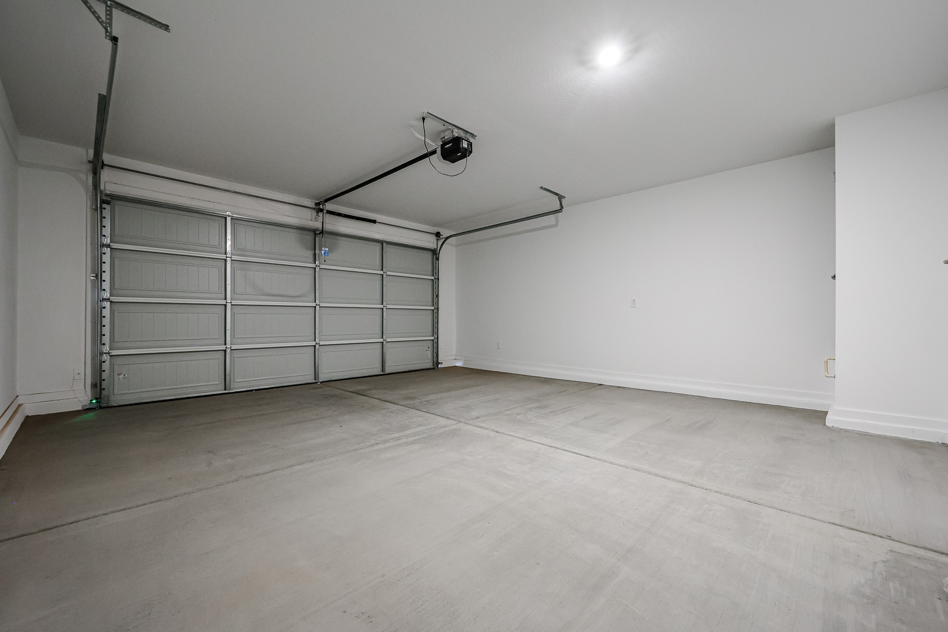 A room with a metal gate.