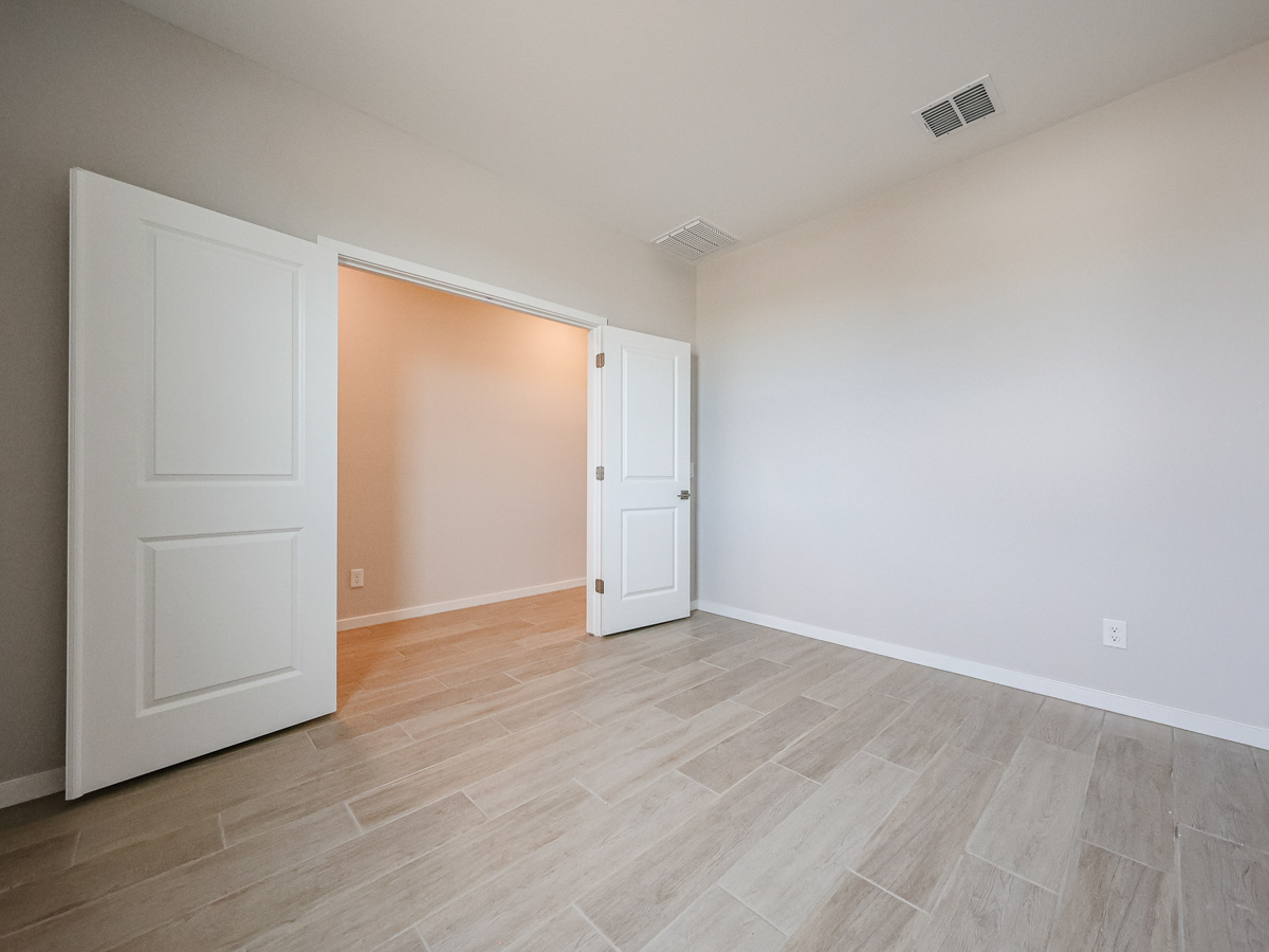 A room with white doors.