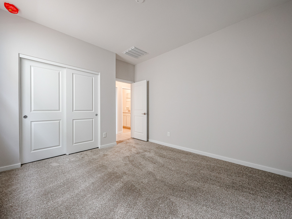 A room with white doors.