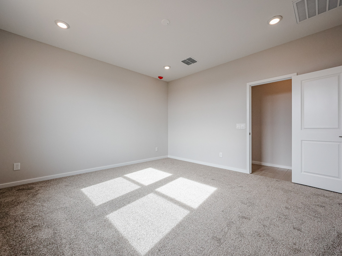 A room with white walls and a white floor.