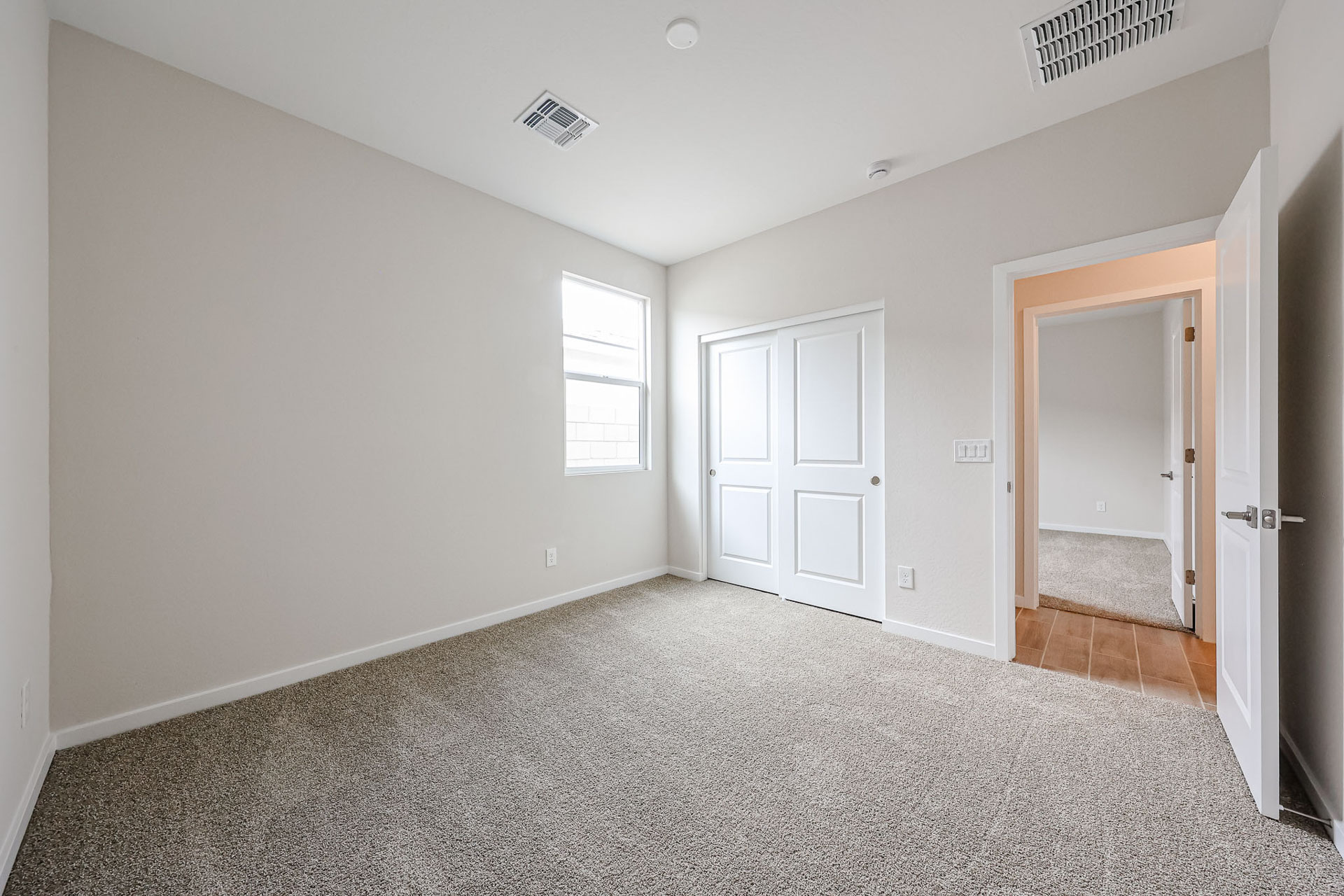A room with white doors.