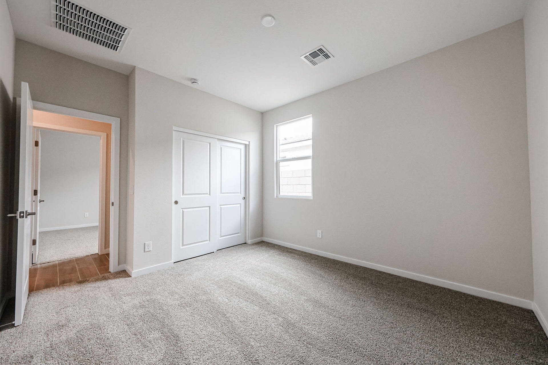 A room with white doors.