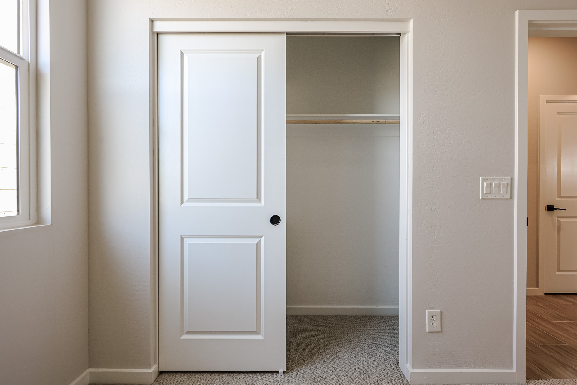 A room with white doors.