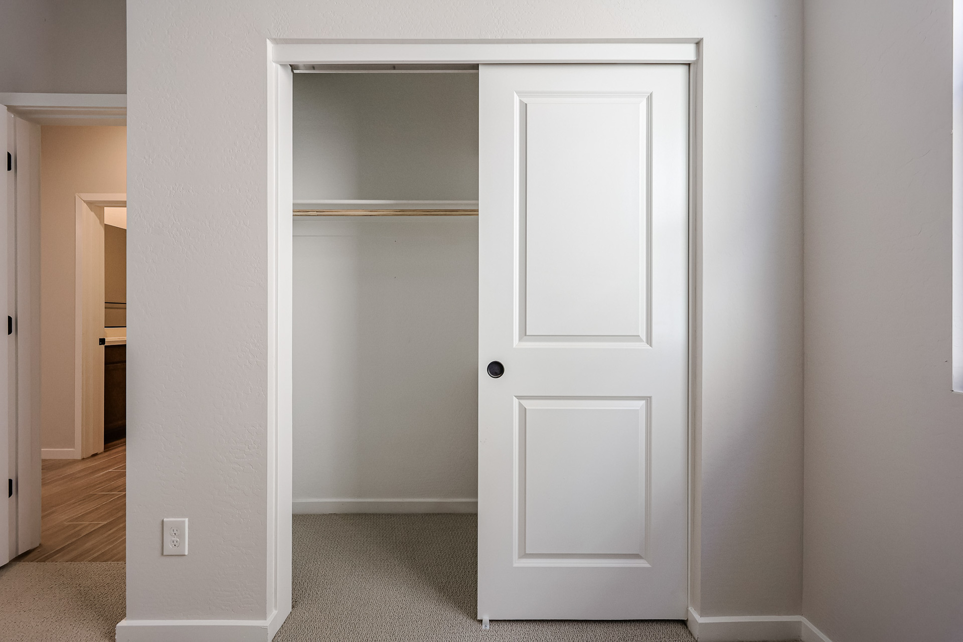 A white door in a room.