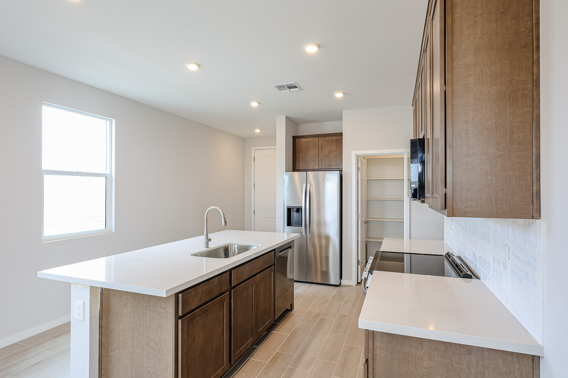 A kitchen with a large island.