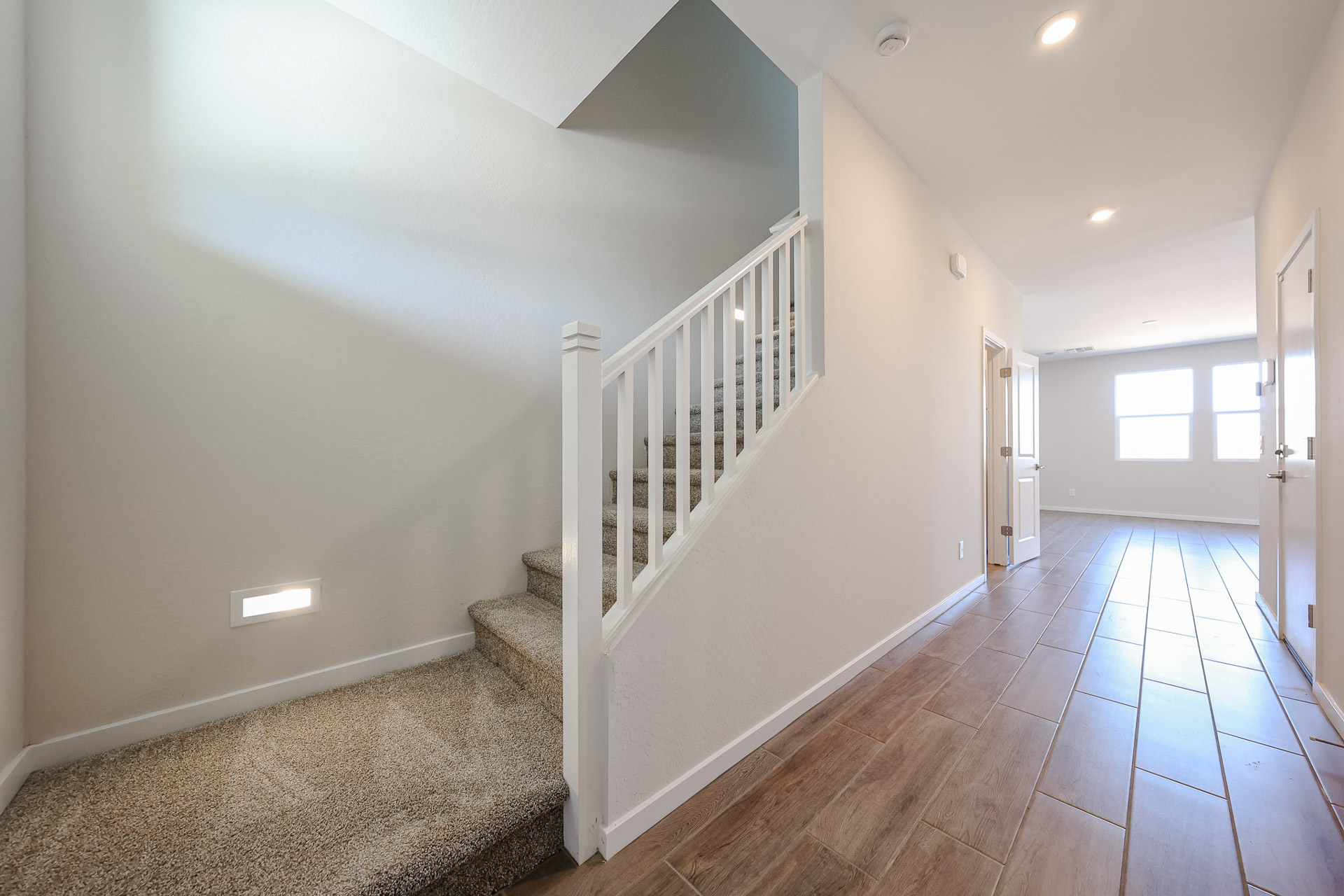 A white staircase in a house.