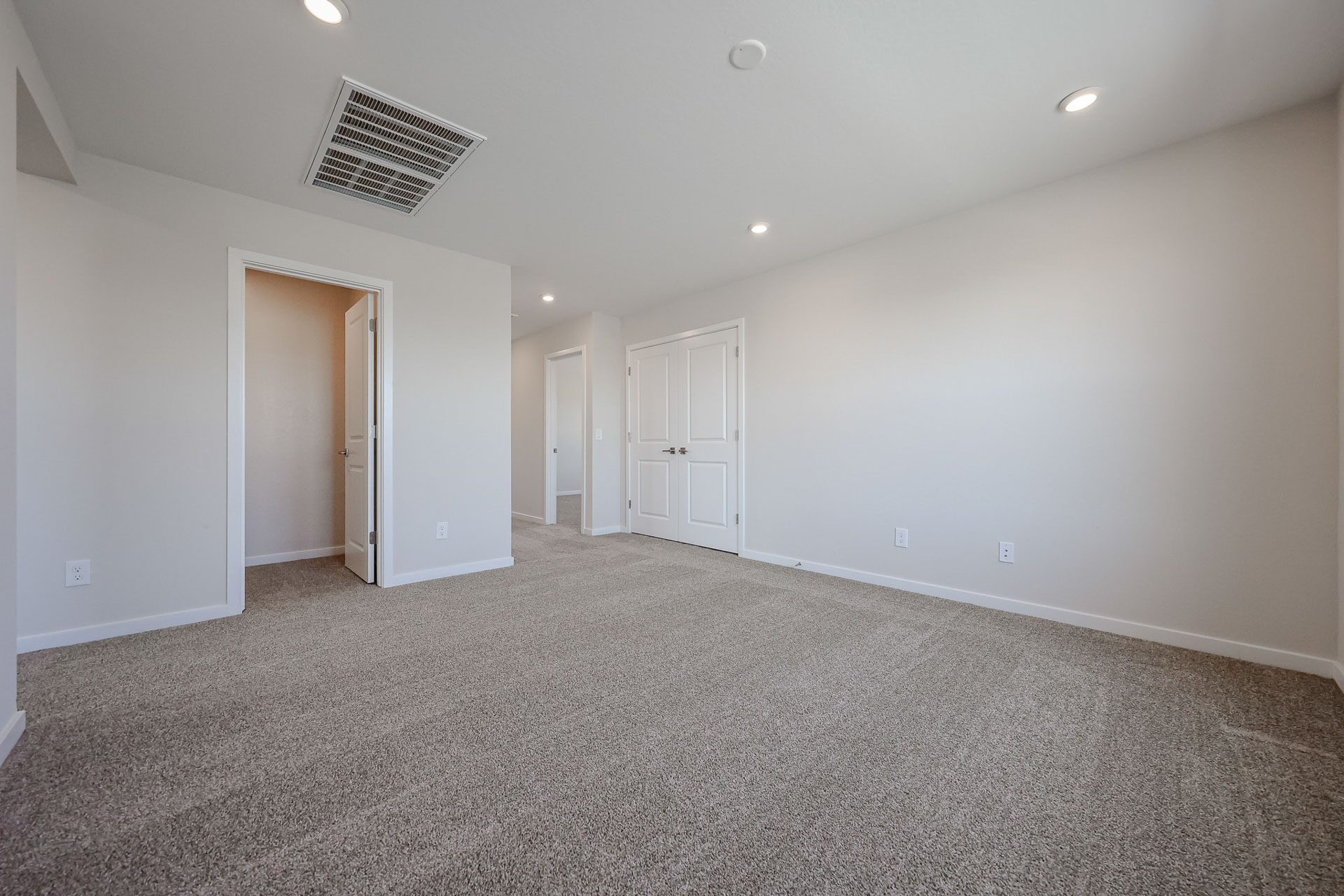 A room with white doors.