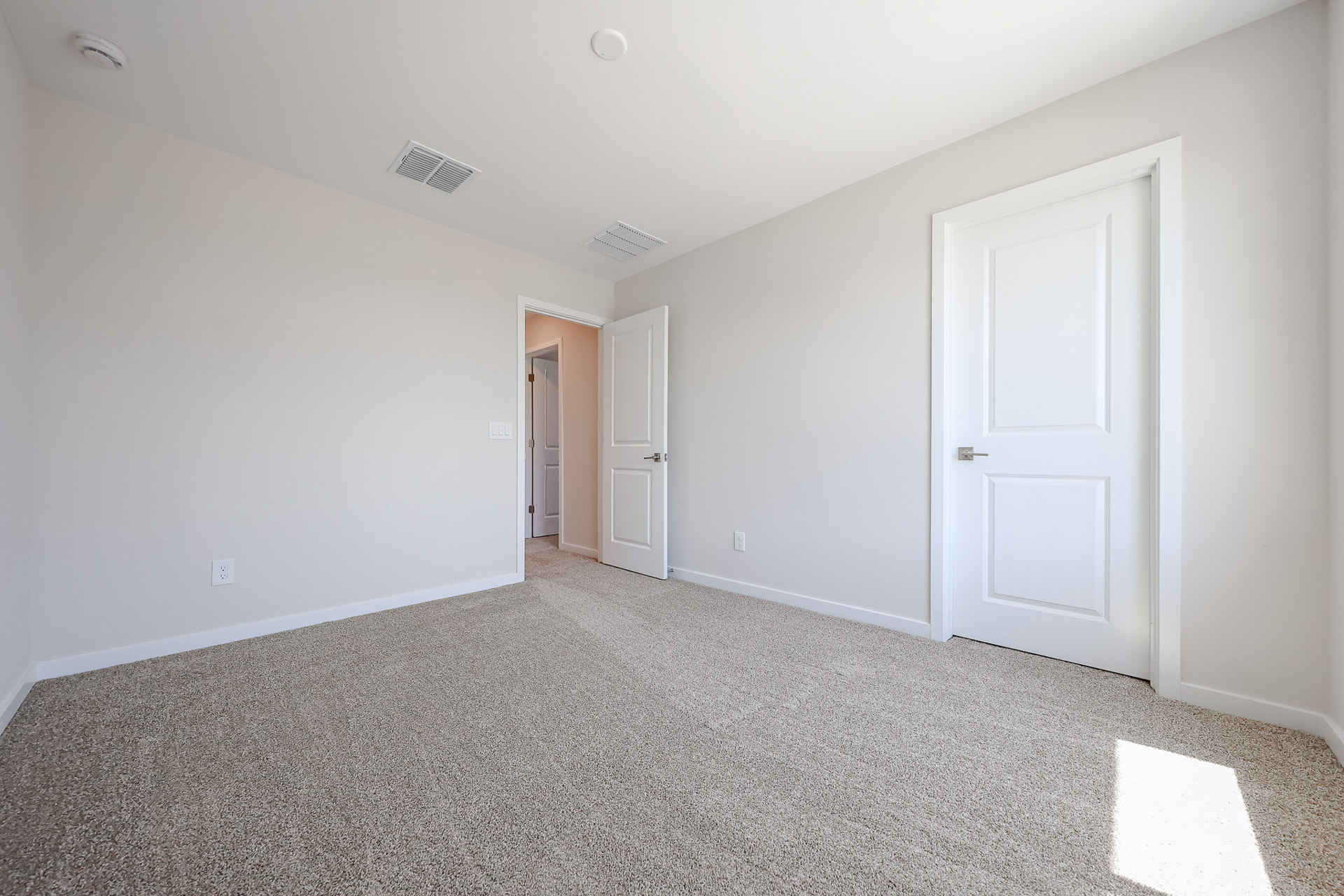 A room with white doors.