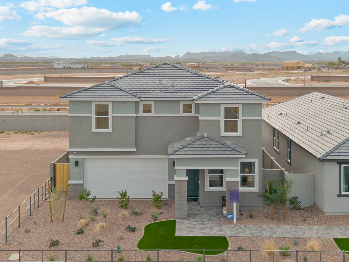A house with a fence around it.