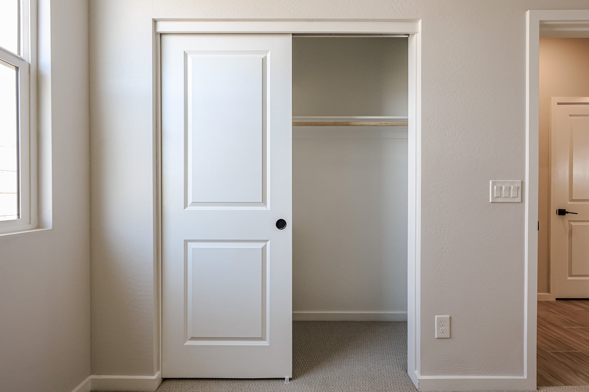 A room with white doors.