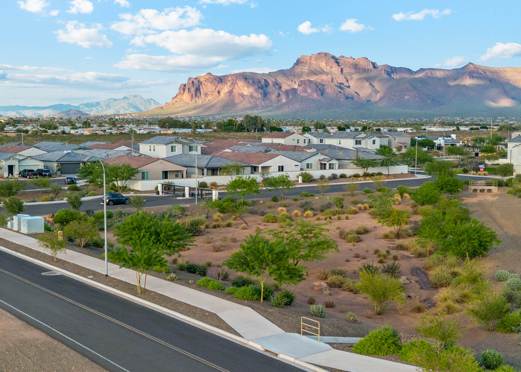 A town with mountains in the background.