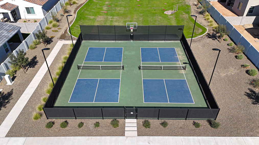 A tennis court with a net.