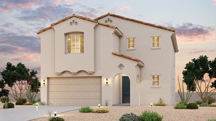 A white house with a garage.