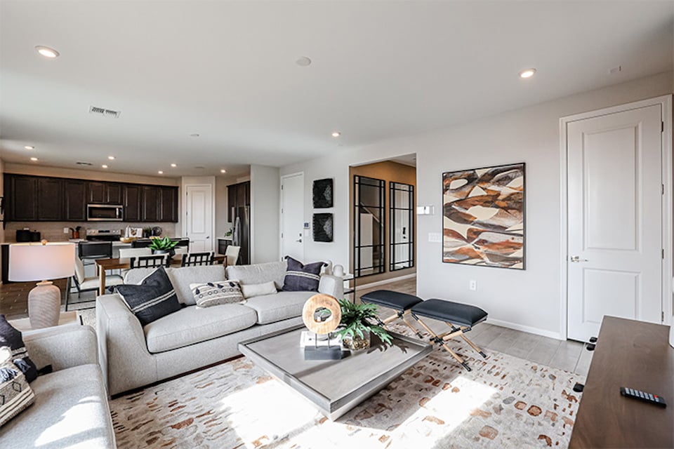 A living room with a couch and a coffee table.