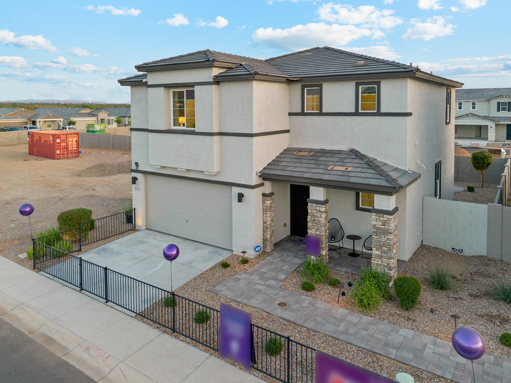 A house with a fence around it.