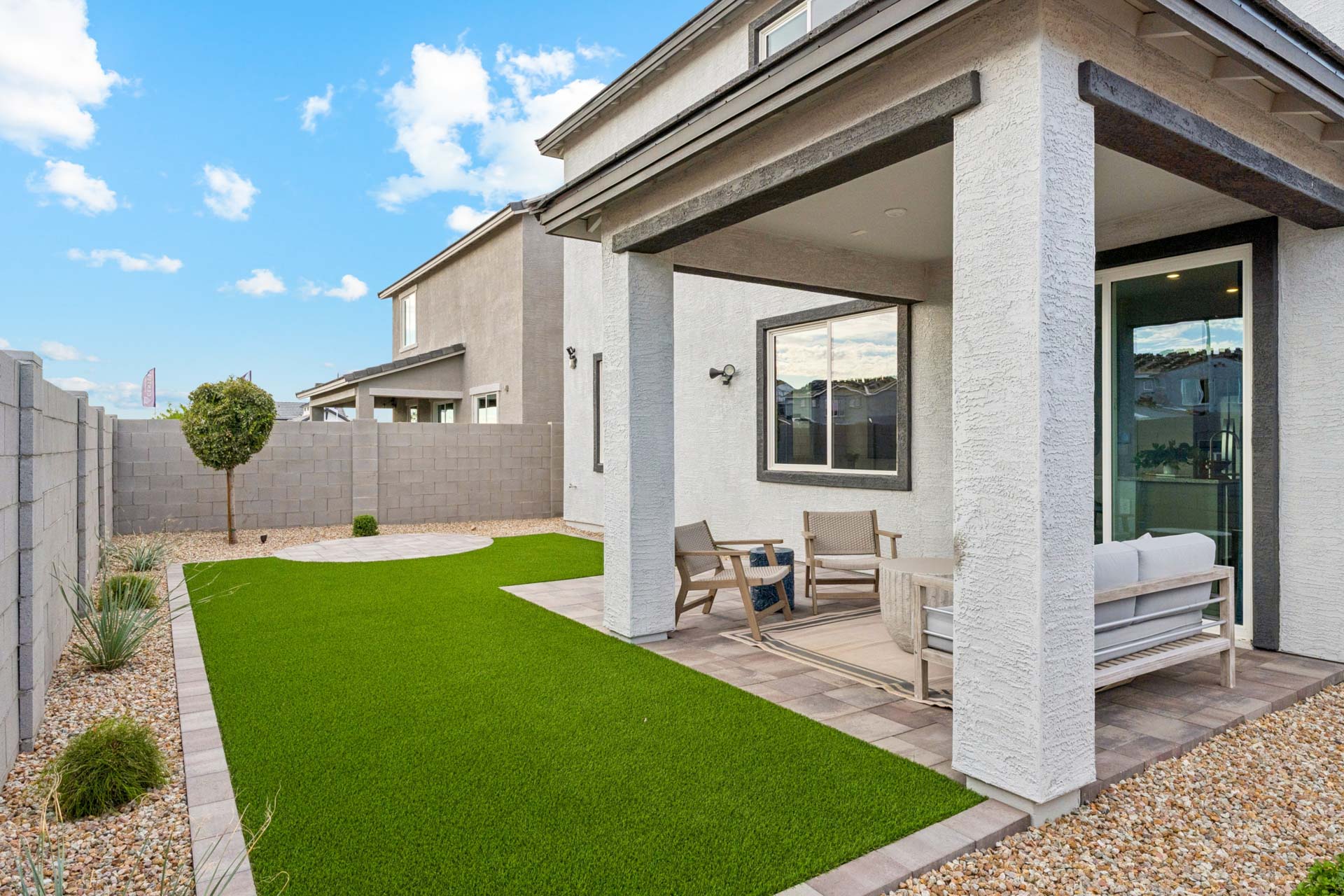 A house with a pool and a patio.