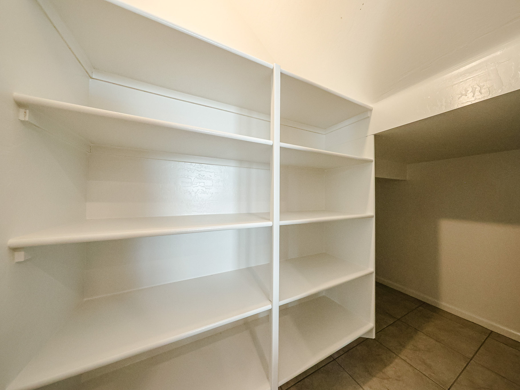 A white shelving unit.