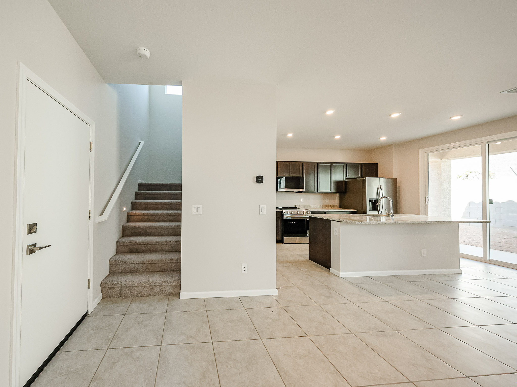 A kitchen and living room.
