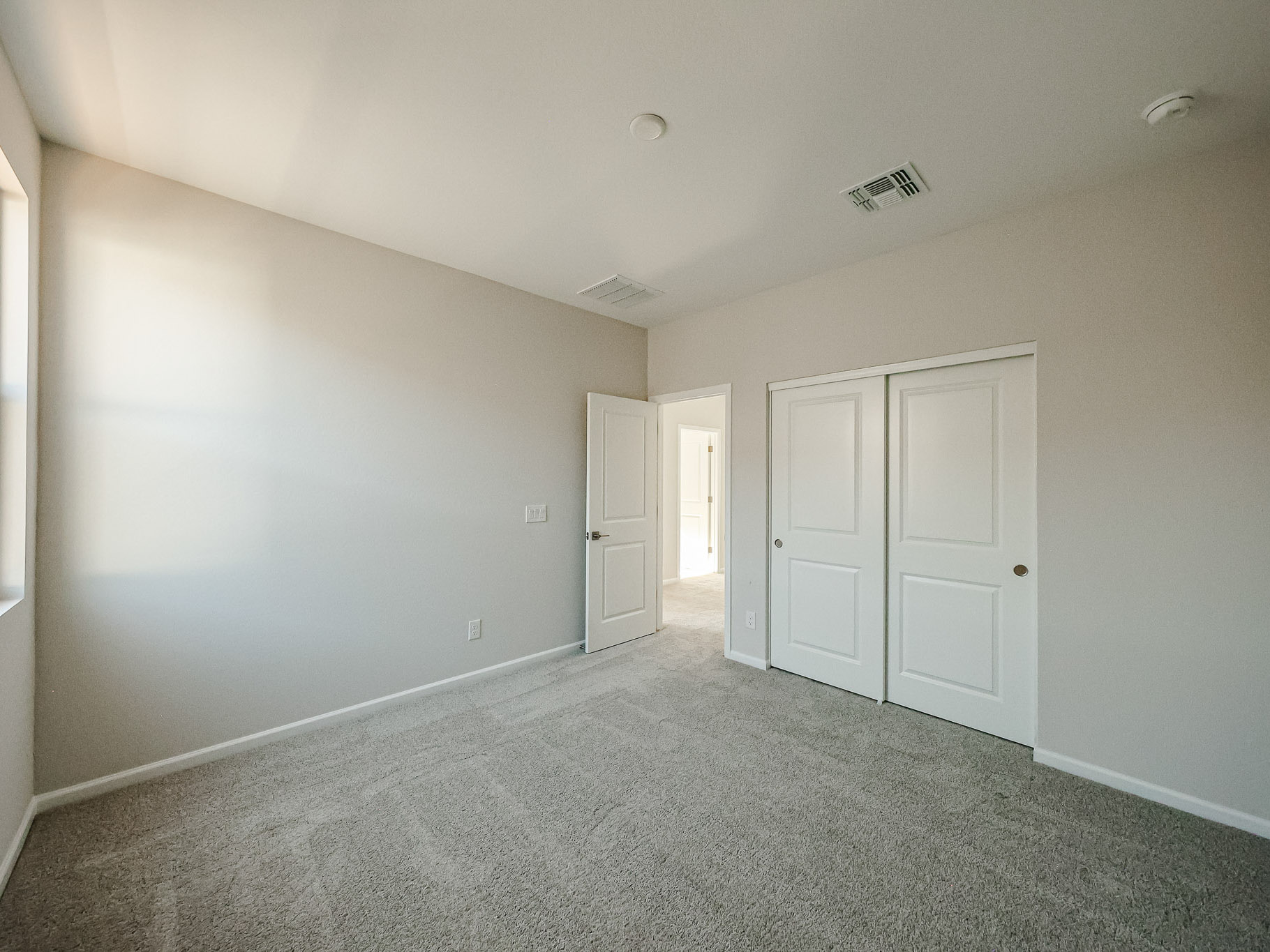 A room with white doors.