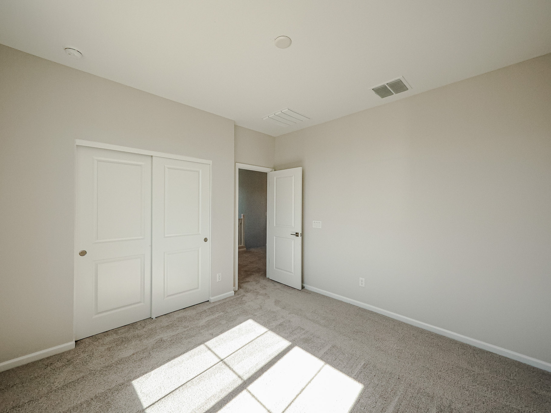 A room with white doors.