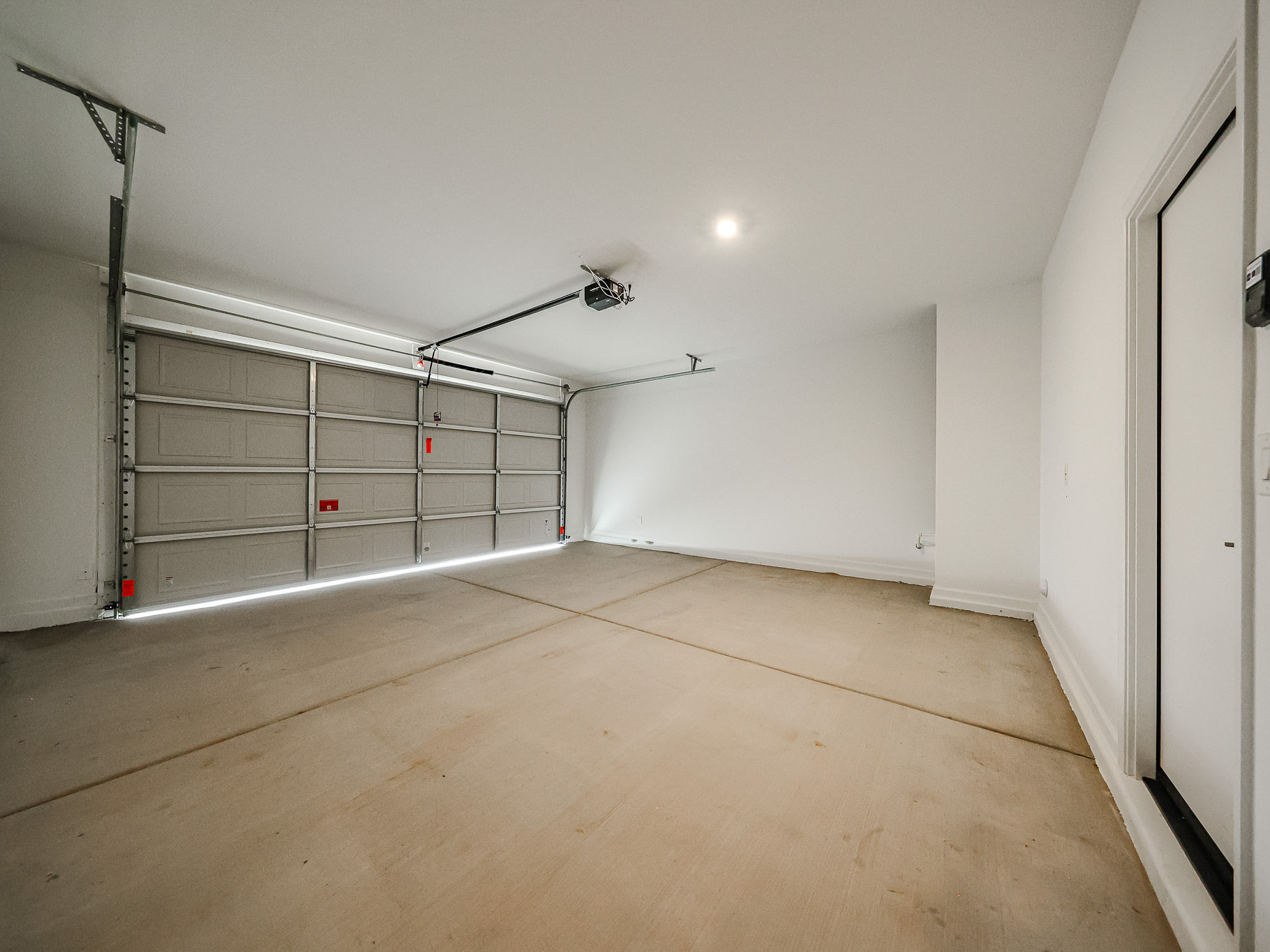 A room with a metal gate.