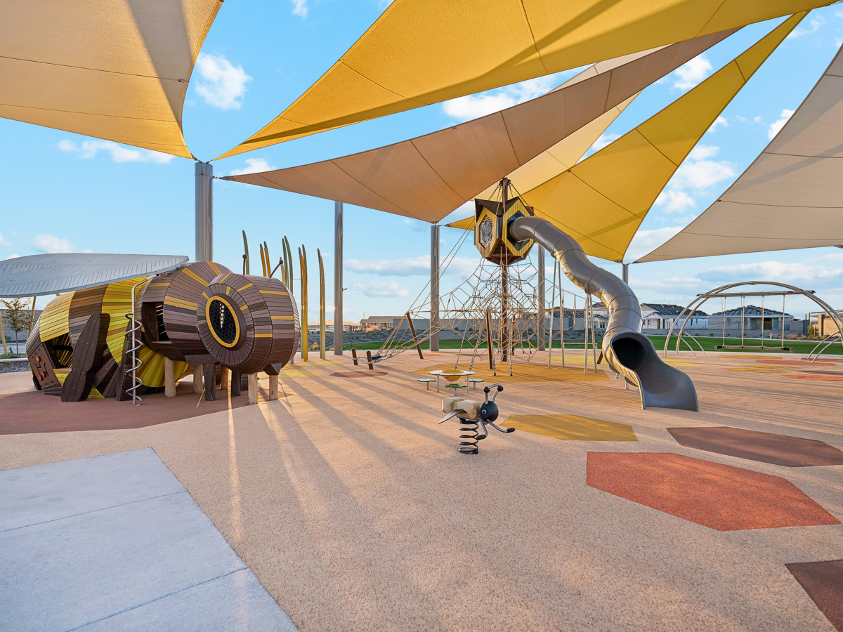 A group of airplanes in a hangar.